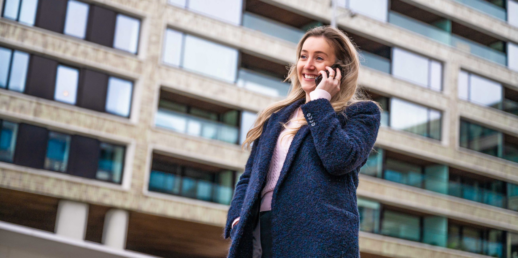 proteqt team member outside on the phone